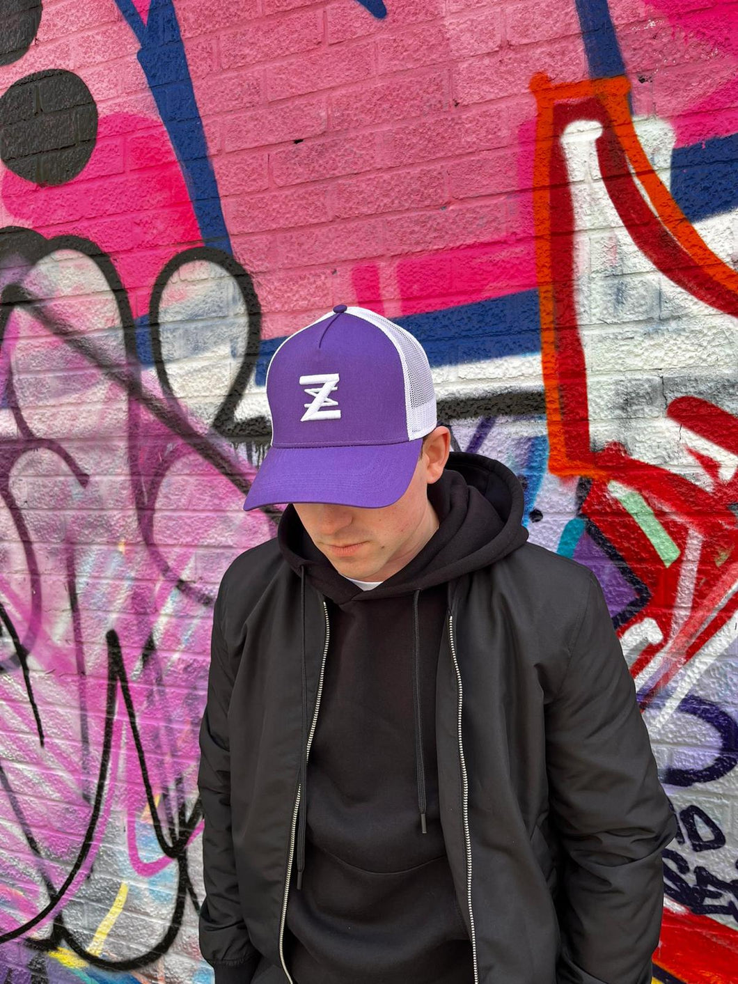 Purple & White logo cap.