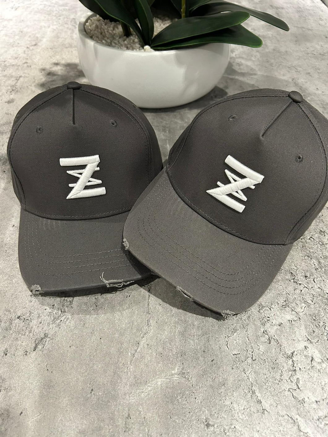 Charcoal distressed logo cap.