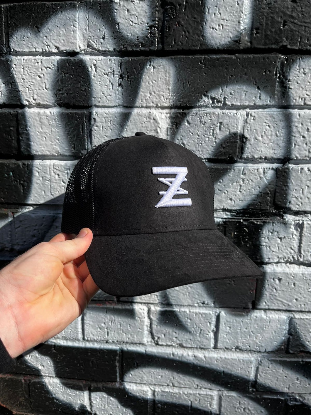 Black suede logo cap.